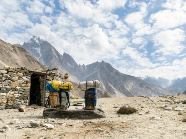 between jhola and paju porters load while trekking to K2